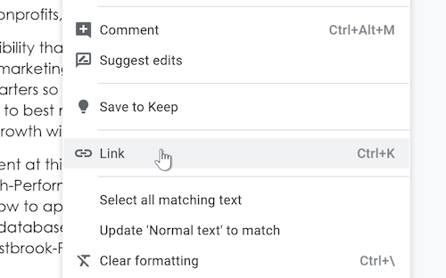 A cursor hovers over the Link option within the Insert drop-down menu. A cursor hovers over the Link option within the Insert drop-down menu.